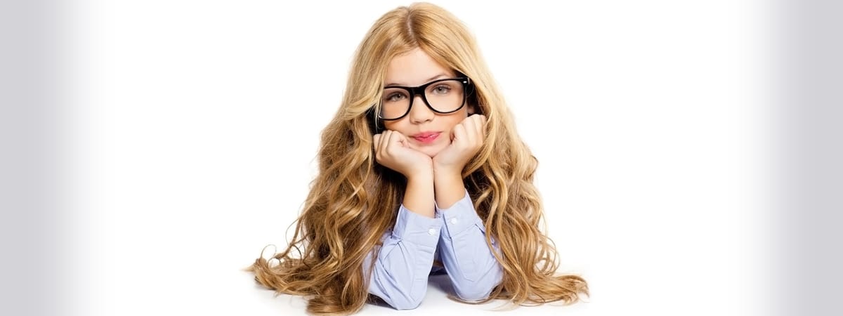 A child wearing a pair of glasses